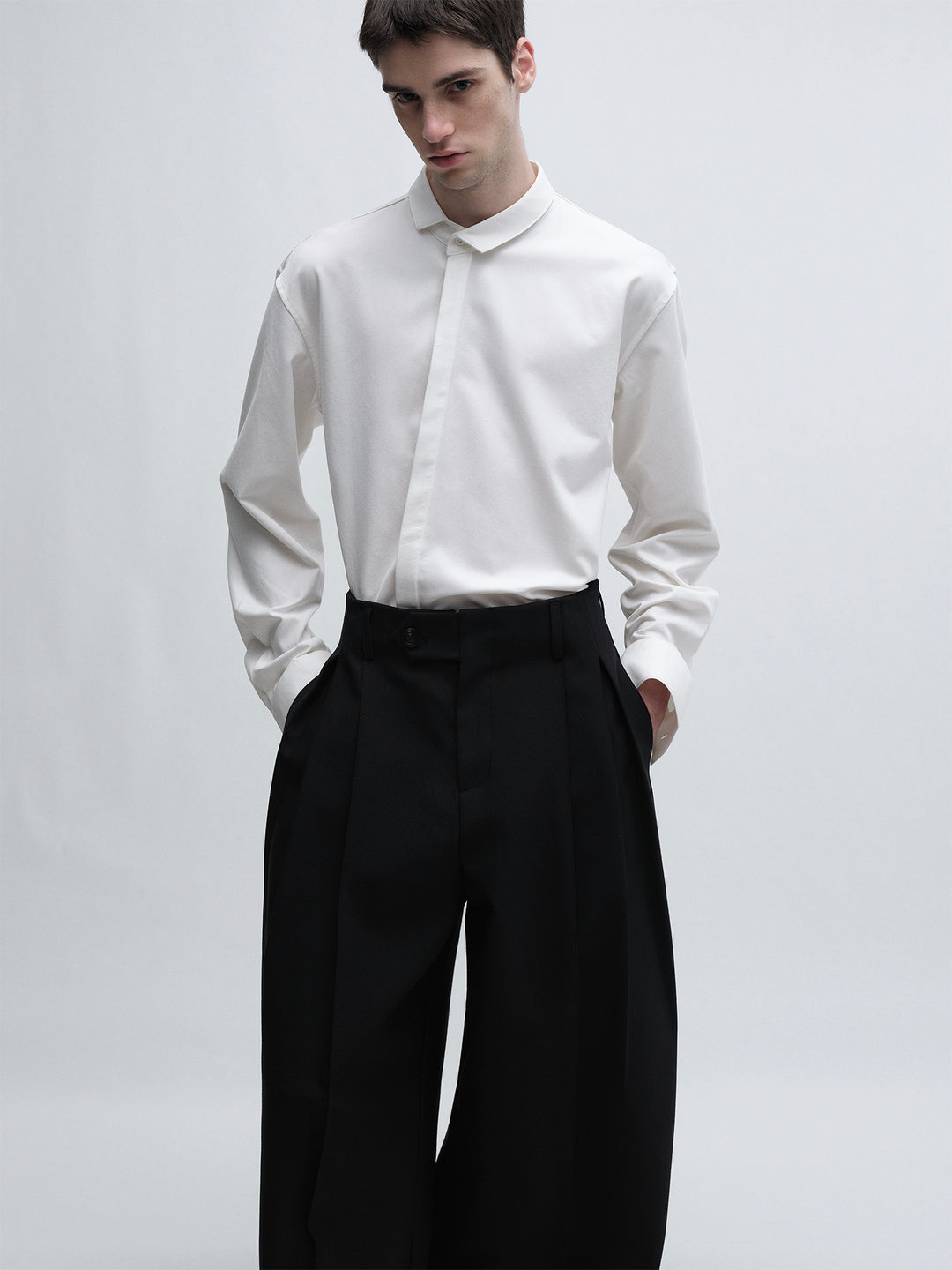 White Shirt With Slanted Collar Design And Hidden Placket