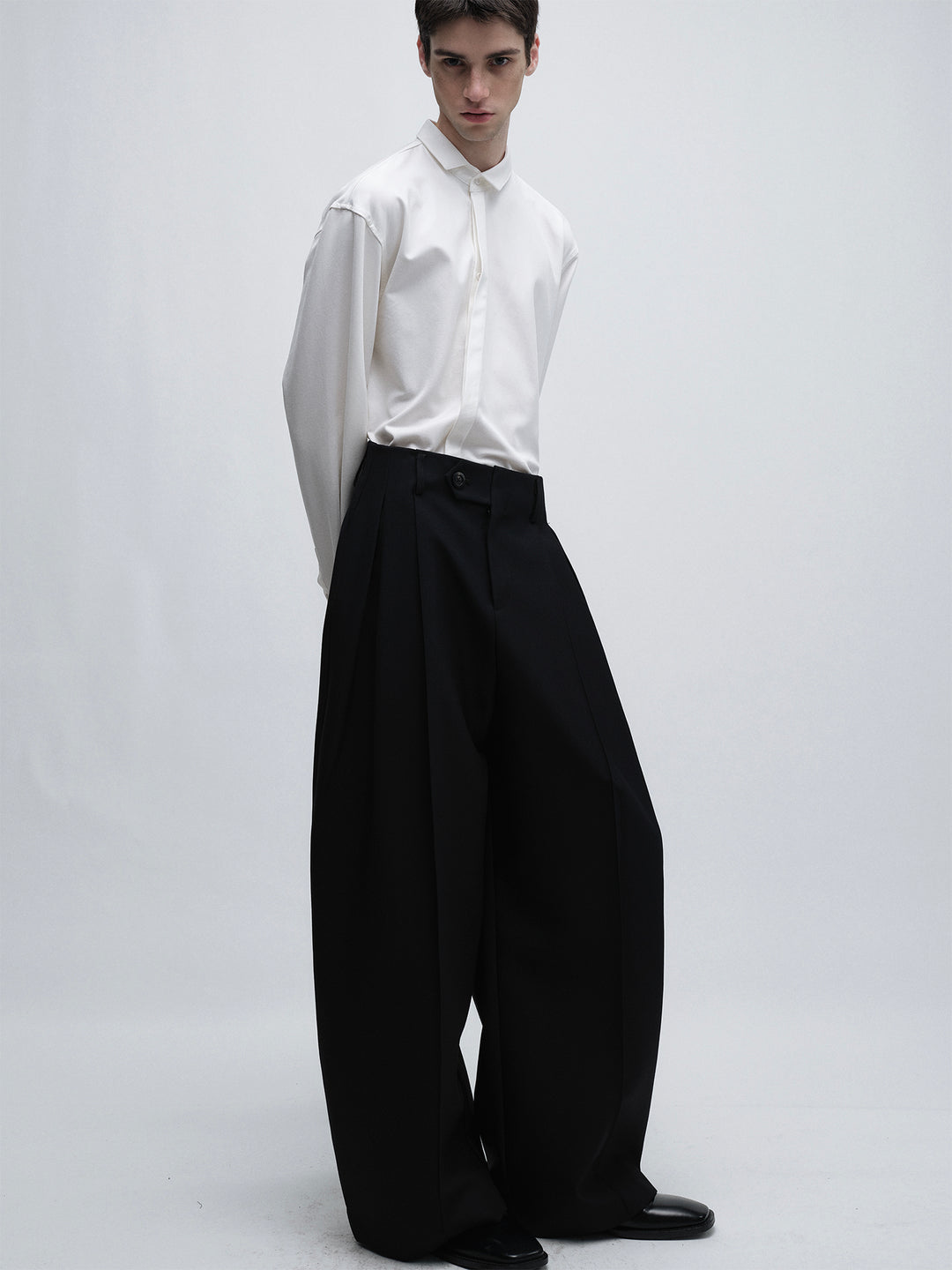 White Shirt With Slanted Collar Design And Hidden Placket