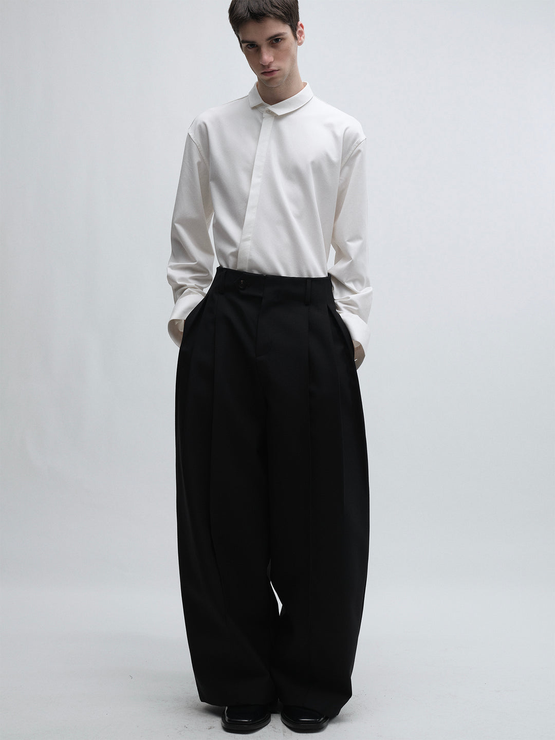 White Shirt With Slanted Collar Design And Hidden Placket
