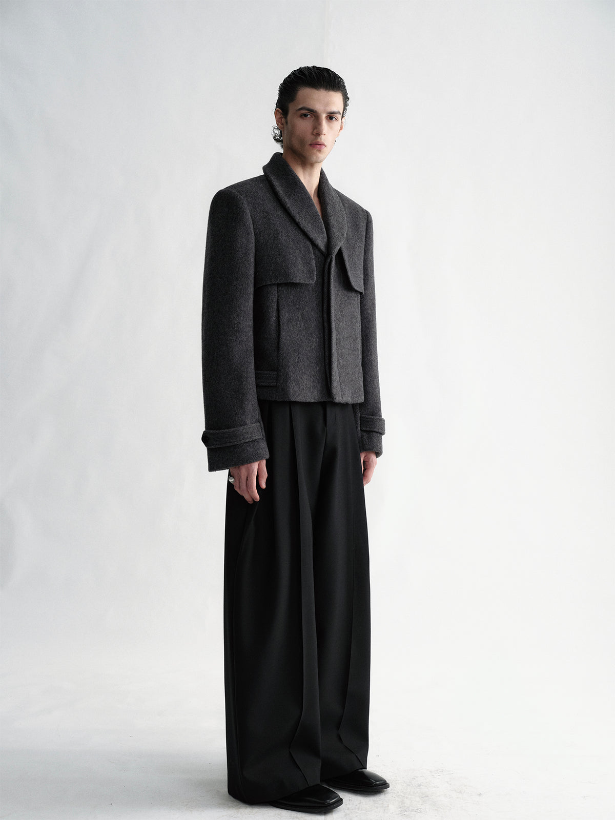 Dark gray textured woolen short coat with shawl collar and hidden placket design