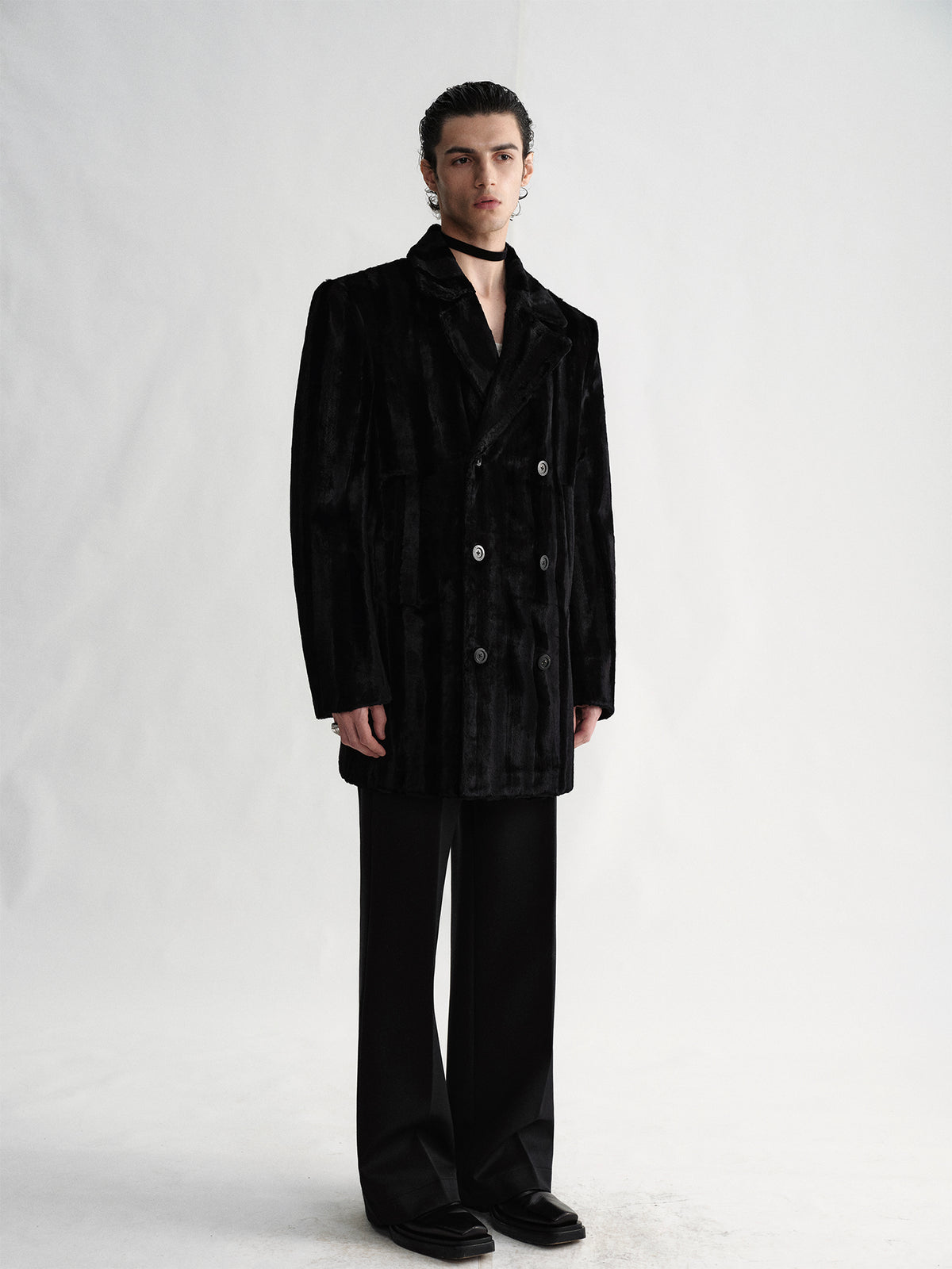 Mid length coat with acetate suede texture and double breasted design