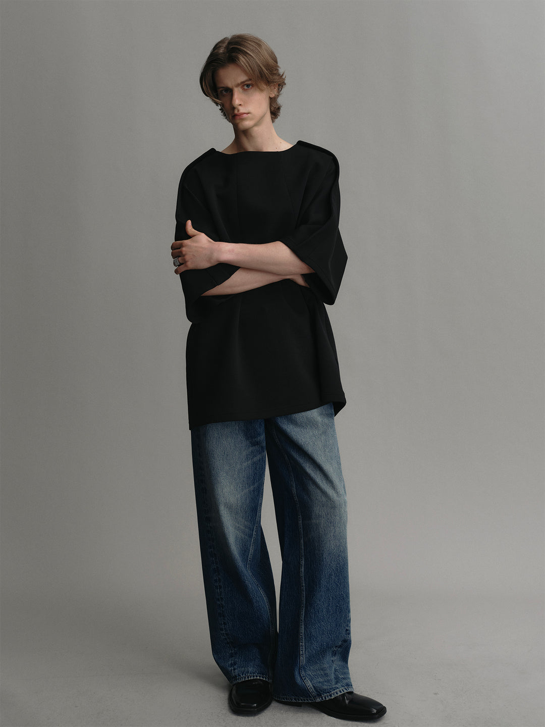 Black T-shirt With A Trapezoidal Collar Design And An Airy Silhouette