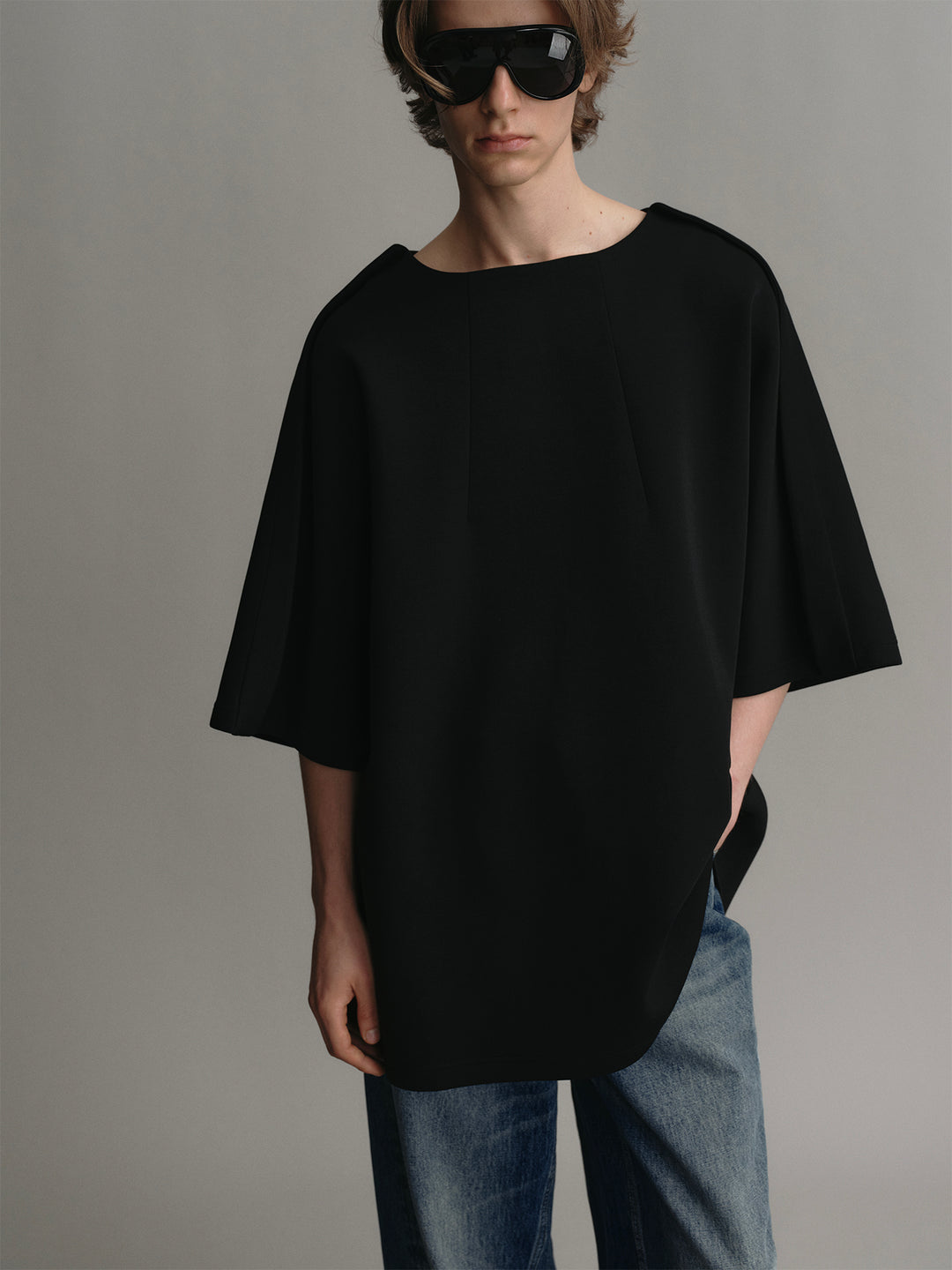 Black T-shirt With A Trapezoidal Collar Design And An Airy Silhouette