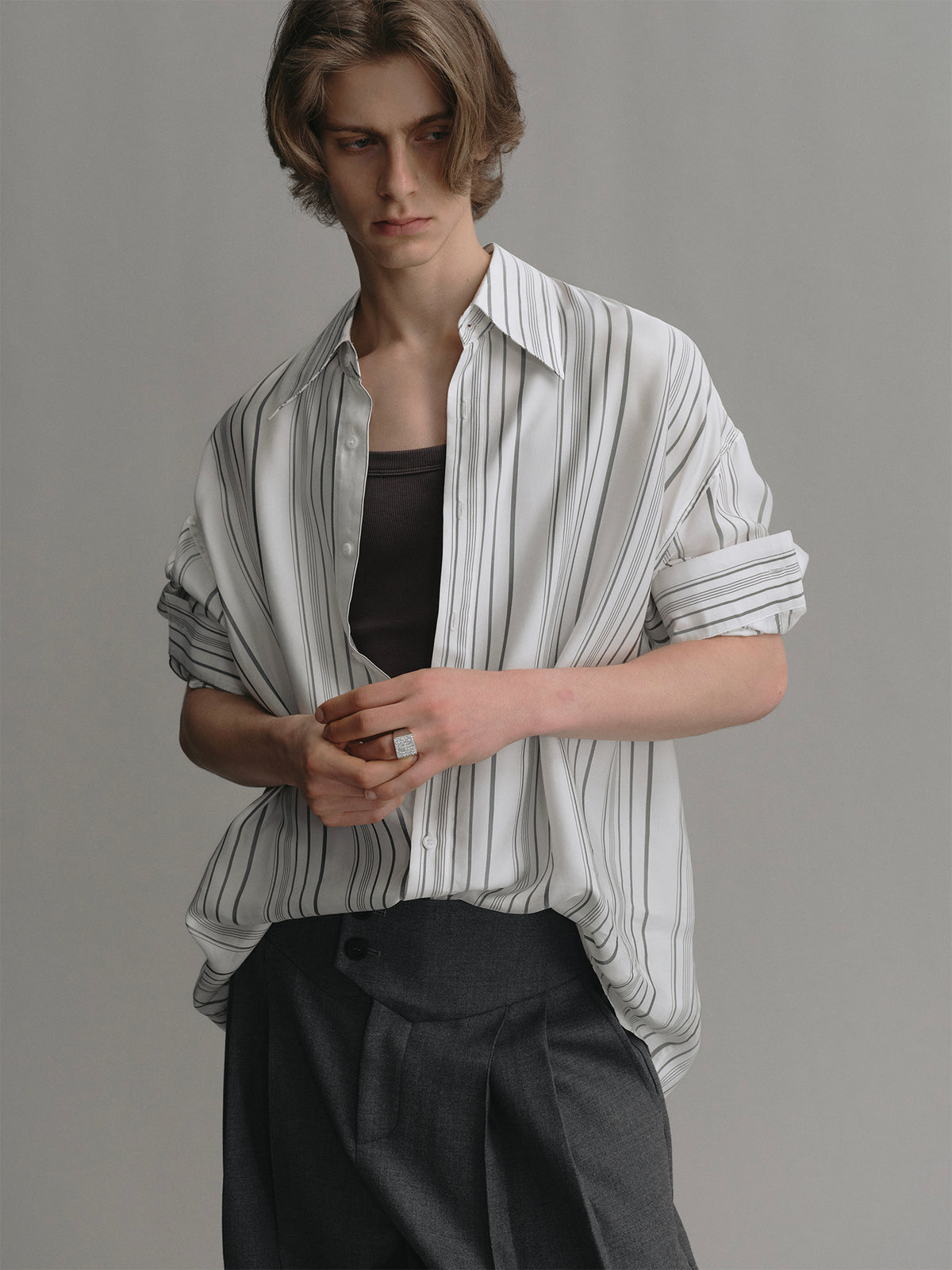 Loose silhouette shirt with grey stripes made of drapey cupro fabric